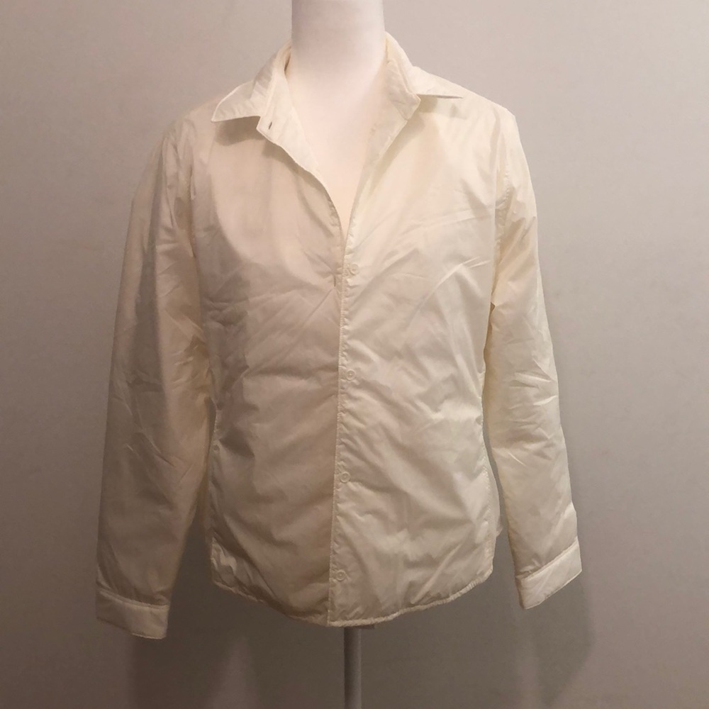 UNIQLO cream colored light weight jacket.